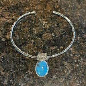 Silver tone collar necklace blue pendant
